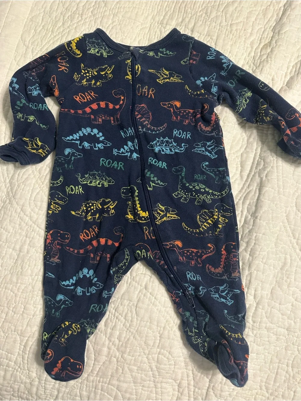 0287 4 piece set of footed PJs and onesies size 0-3 and newborn